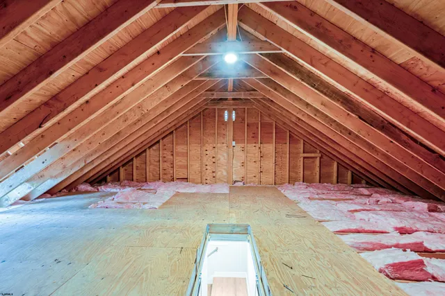 a swimming pool with outdoor seating and yard