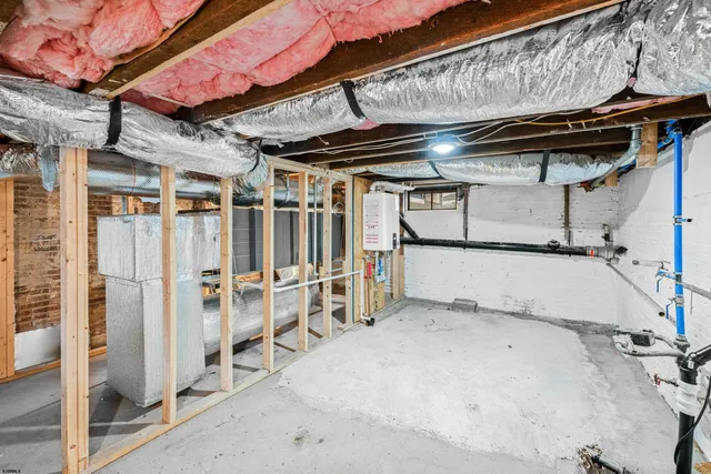 a front view of a house with yard and seating area