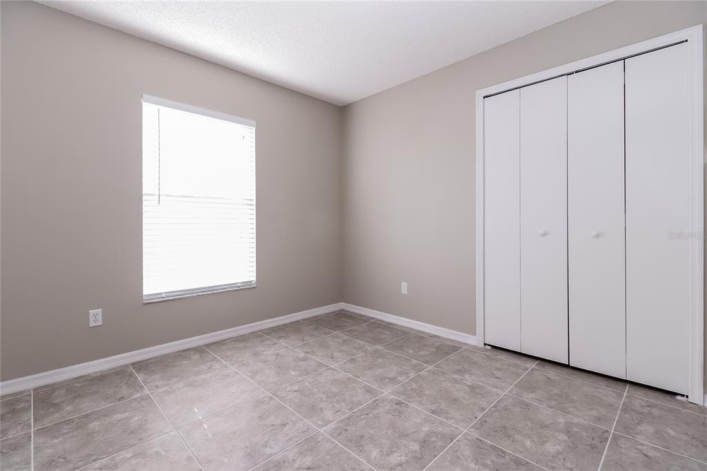 605 Dorothy Circle Eustis, FL 32726 - Photo 12 of 15 an empty room with a window