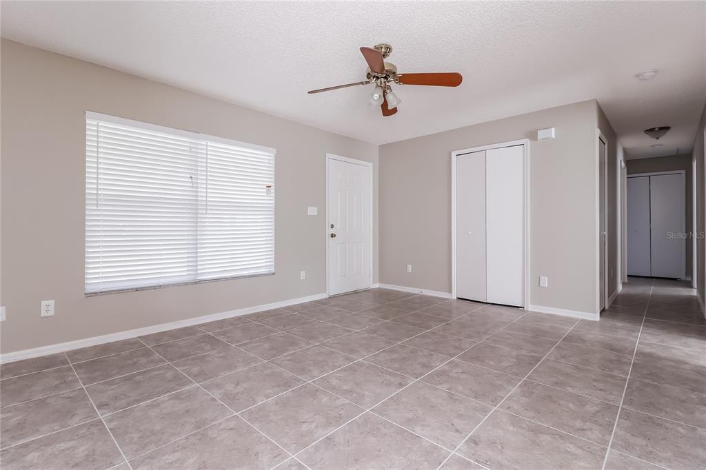 605 Dorothy Circle Eustis, FL 32726 - Photo 2 of 15 a view of an empty room with a window