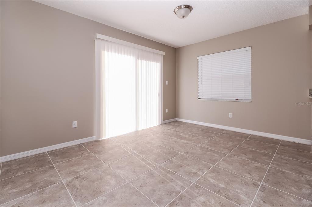 605 Dorothy Circle Eustis, FL 32726 - Photo 5 of 15 an empty room with windows