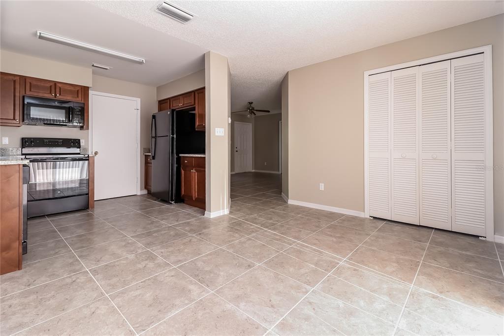 605 Dorothy Circle Eustis, FL 32726 - Photo 6 of 15 a view of a livingroom with a kitchen