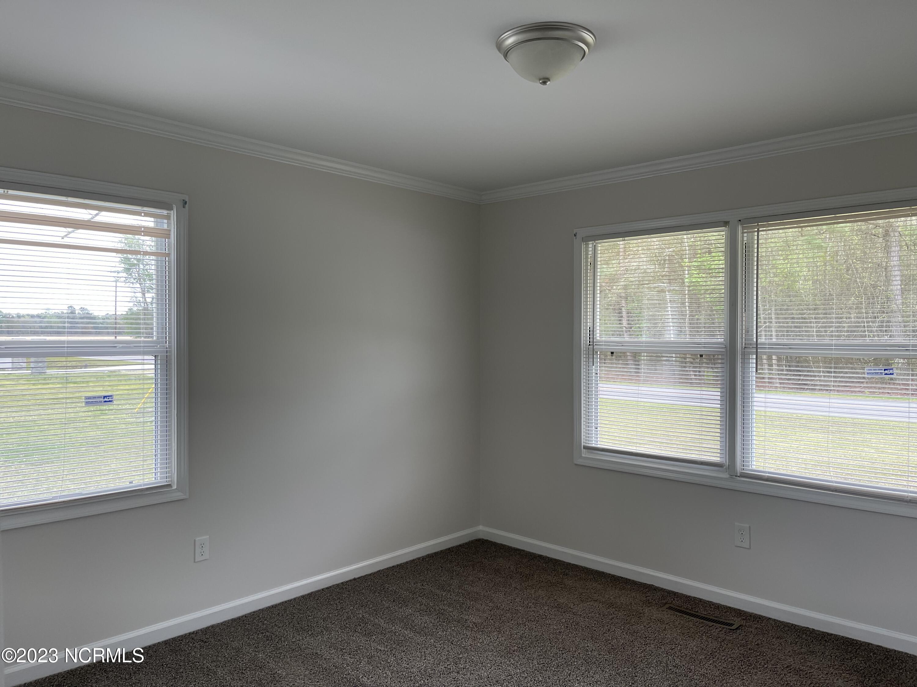6992 Myrtle Head Road Northwest Ash, NC 28420 - Photo 15 of 20 Front Right Bedroom