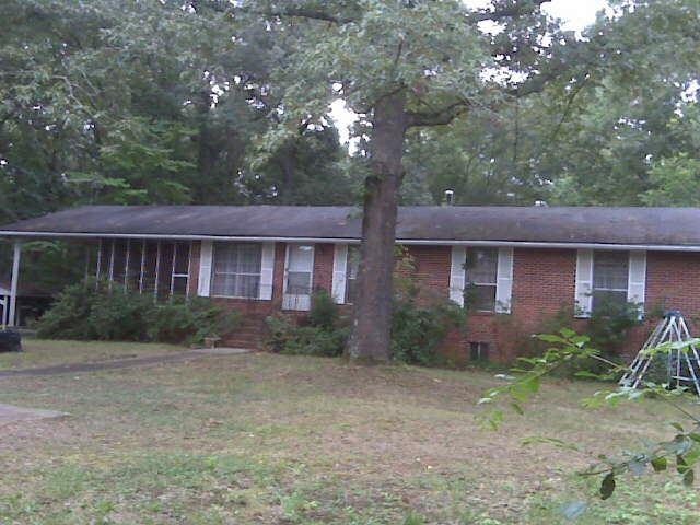 4820 High Falls Road Jackson, GA 30233 - Photo 1 of 1 a front view of a house with garden
