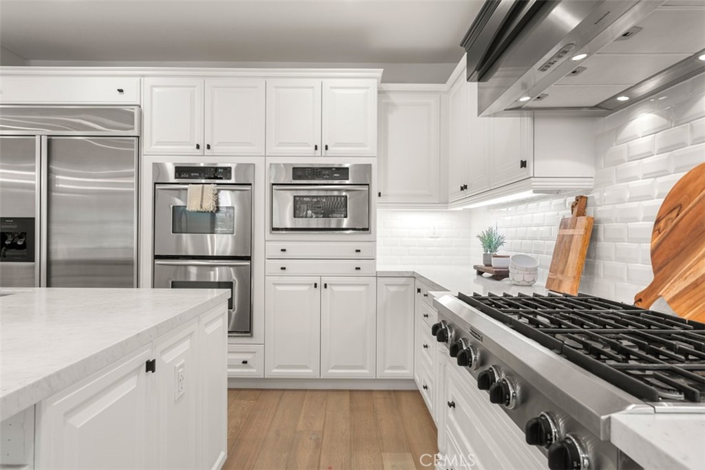 21 Via Nerisa San Clemente, CA 92673 - Photo 12 of 54 a kitchen with cabinets and appliances