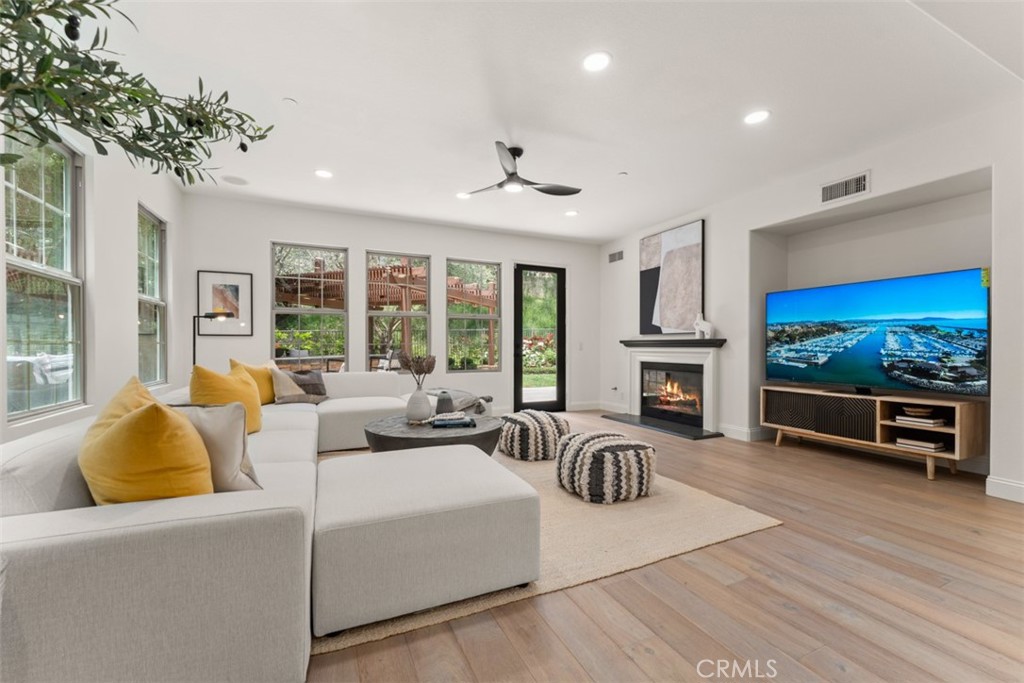 21 Via Nerisa San Clemente, CA 92673 - Photo 14 of 54 a living room with furniture fireplace and flat screen tv