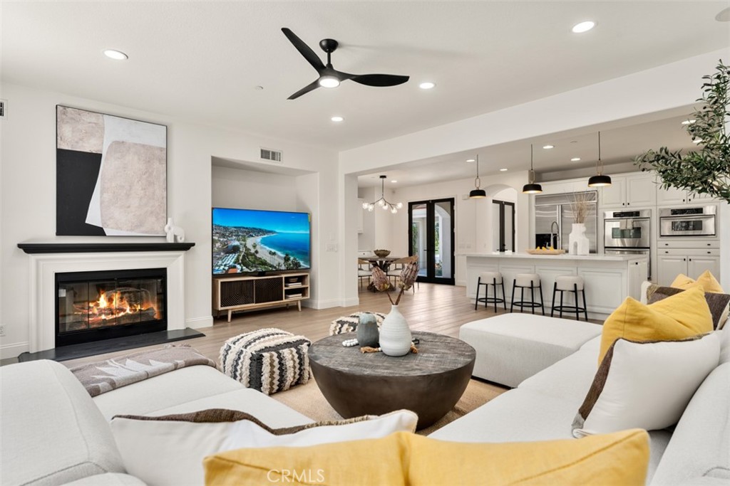 21 Via Nerisa San Clemente, CA 92673 - Photo 16 of 54 a living room with furniture and a fireplace