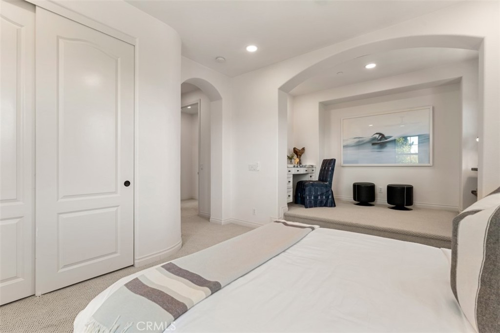 21 Via Nerisa San Clemente, CA 92673 - Photo 24 of 54 a bedroom with a bed and a fireplace