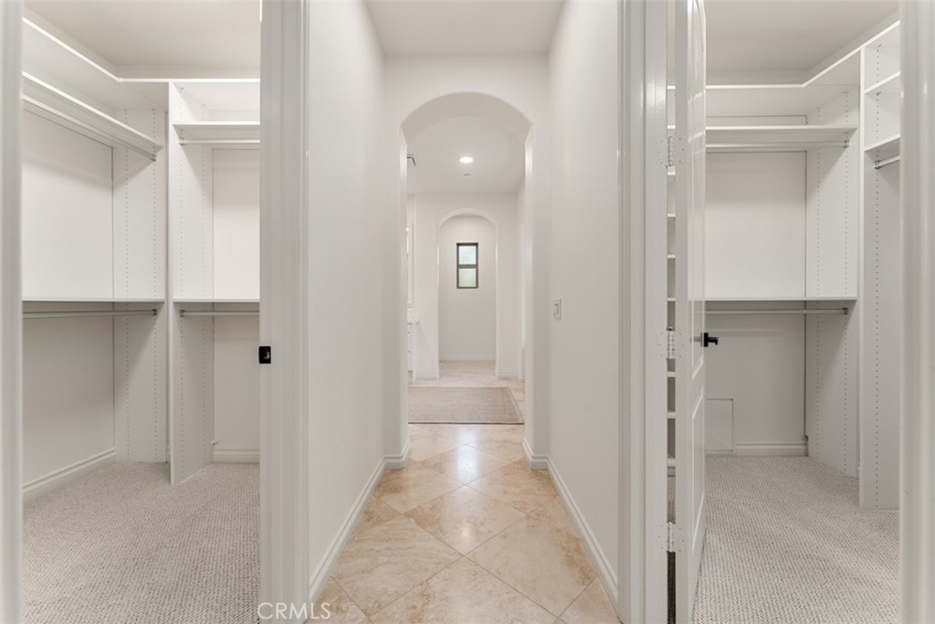 21 Via Nerisa San Clemente, CA 92673 - Photo 31 of 54 a view of a hallway with closet and wooden floor
