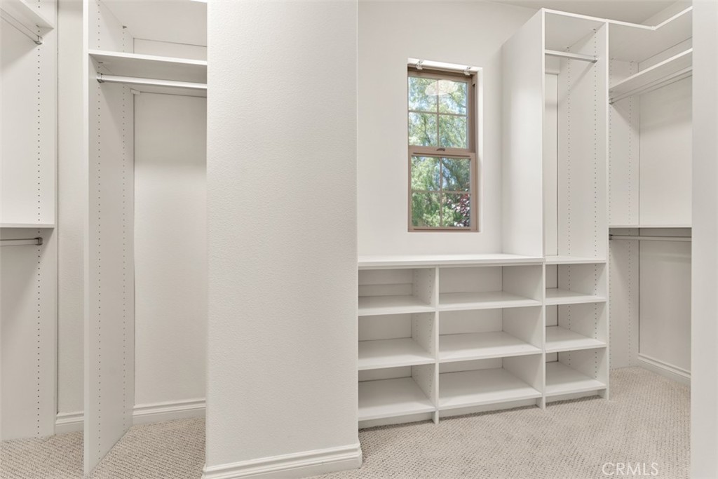 21 Via Nerisa San Clemente, CA 92673 - Photo 32 of 54 a view of a closet area with empty racks