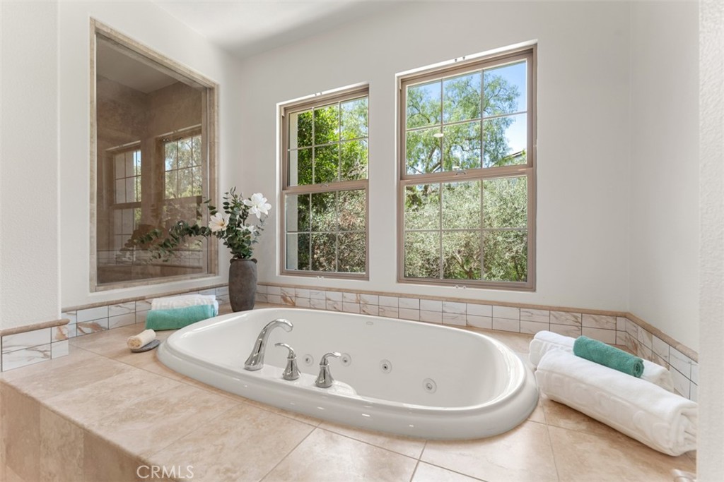 21 Via Nerisa San Clemente, CA 92673 - Photo 35 of 54 a bath tub sitting in a bathroom next to a window
