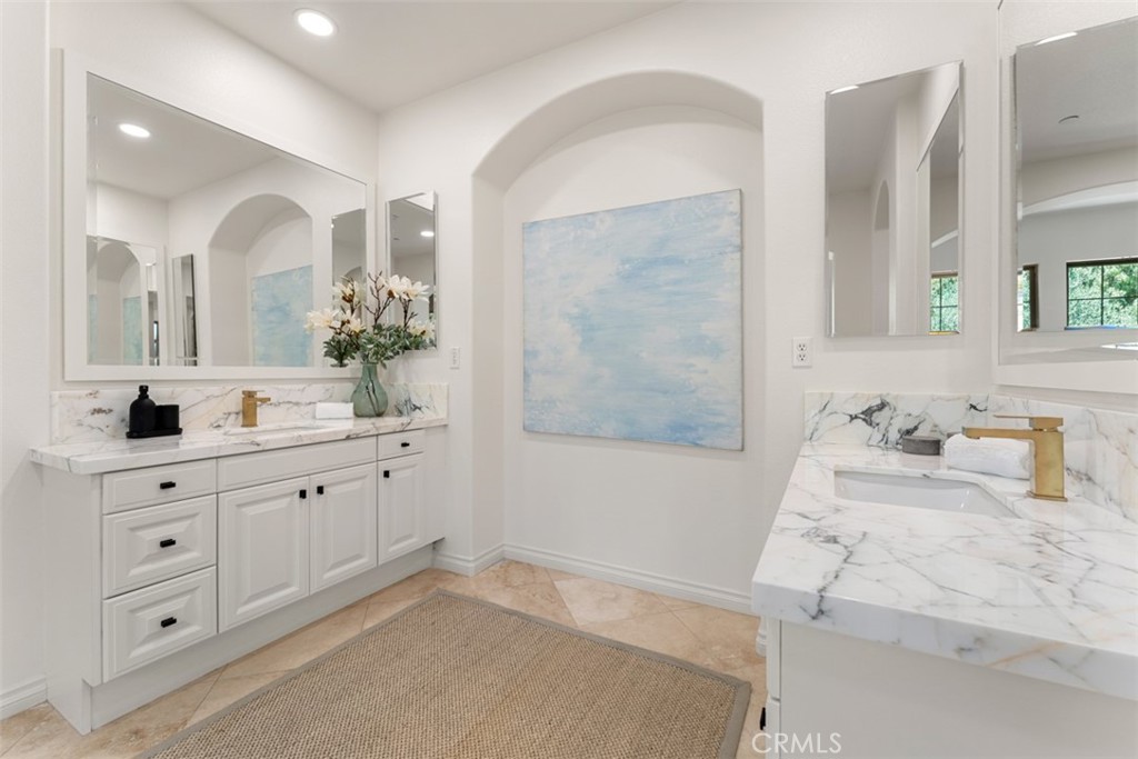 21 Via Nerisa San Clemente, CA 92673 - Photo 36 of 54 a en suite bathroom with double sink and a mirror
