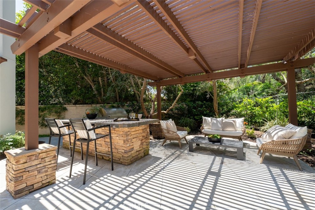 21 Via Nerisa San Clemente, CA 92673 - Photo 37 of 54 a living room with patio furniture and a garden