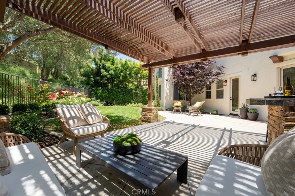 21 Via Nerisa San Clemente, CA 92673 - Photo 40 of 54 a view of a patio with table and chairs and potted plants