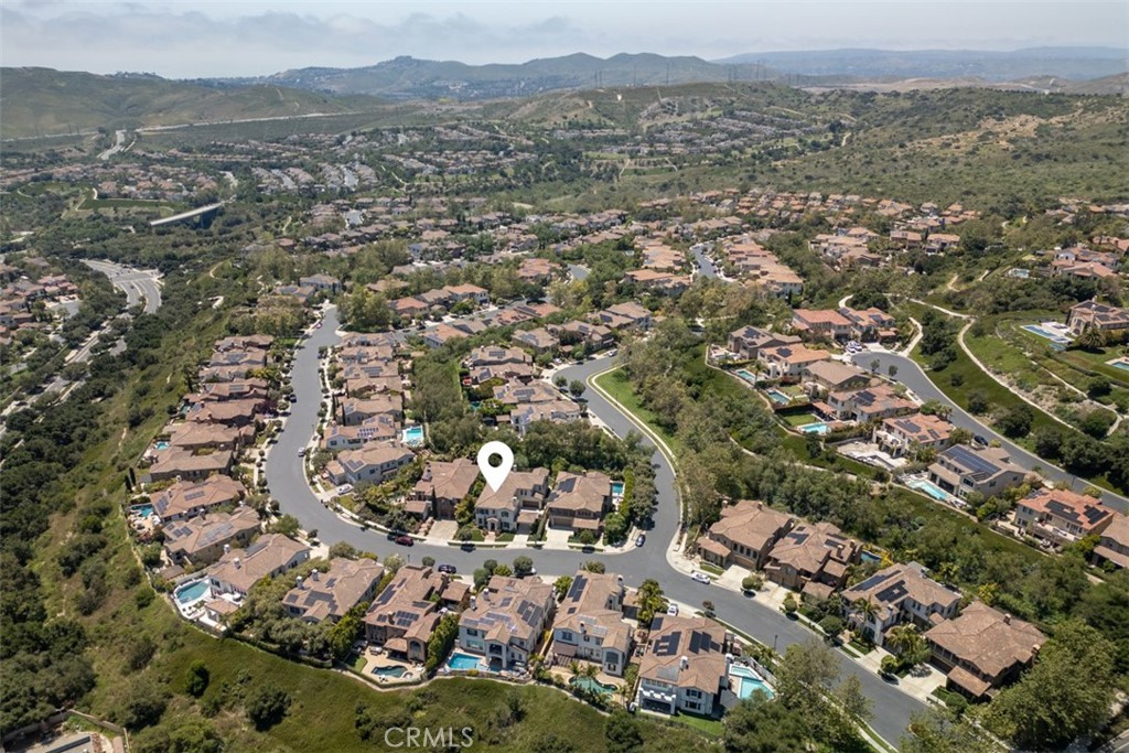 21 Via Nerisa San Clemente, CA 92673 - Photo 47 of 54 an aerial view of a city with lots of residential buildings and mountain view in back