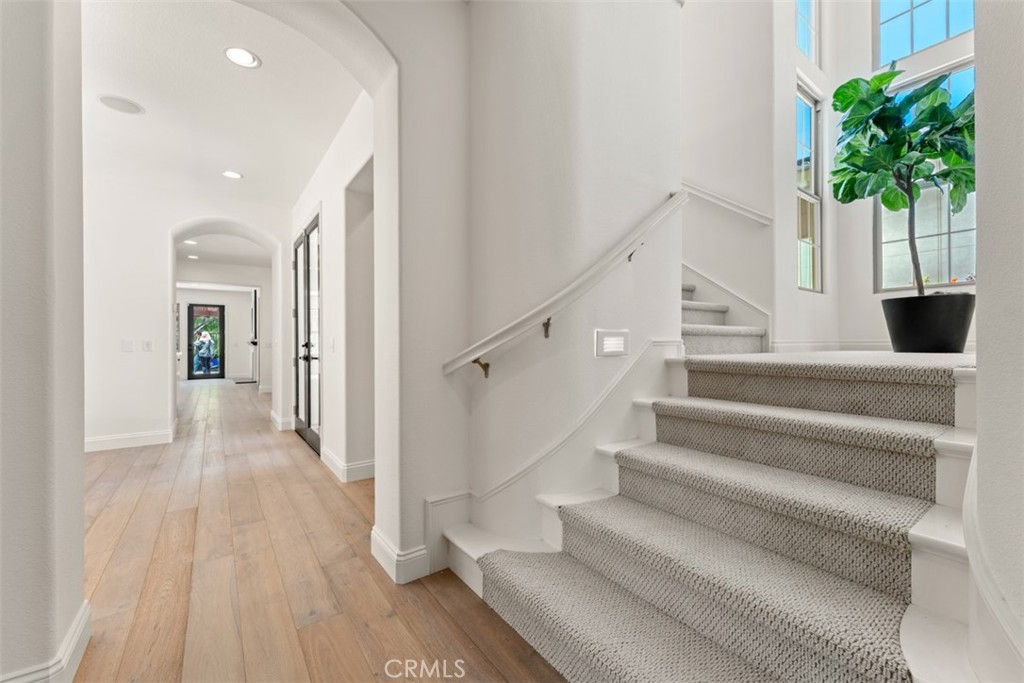 21 Via Nerisa San Clemente, CA 92673 - Photo 9 of 54 a view of entryway with wooden floor and a potted plant