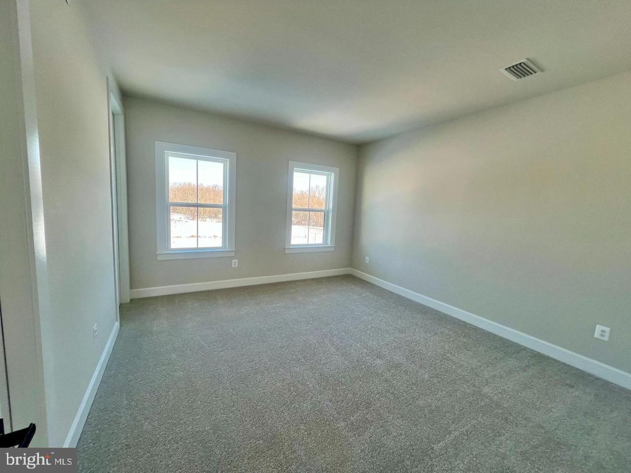 234 Coffman Drive Exton, PA 19341 - Photo 13 of 17 an empty room with windows