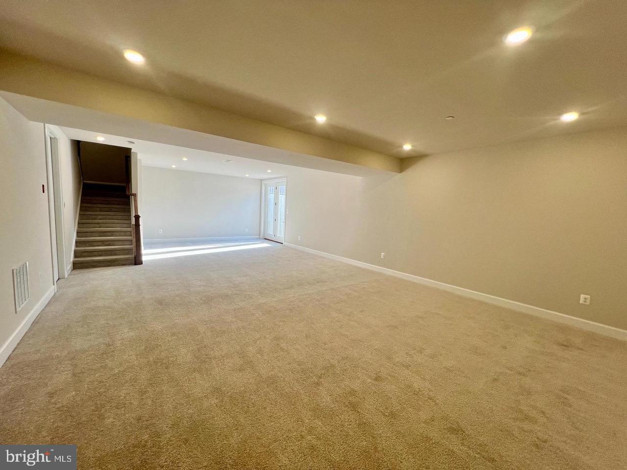 234 Coffman Drive Exton, PA 19341 - Photo 16 of 17 an empty room with windows and pillars in it