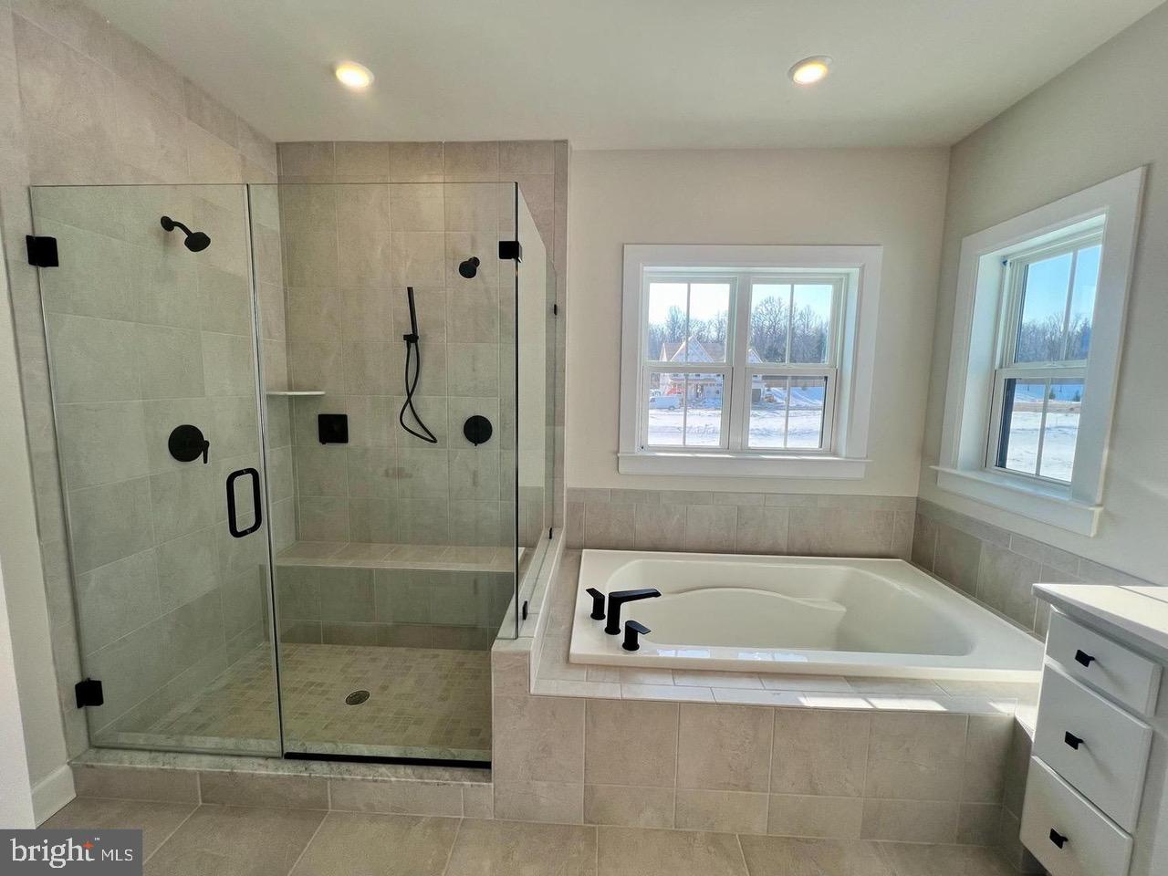 234 Coffman Drive Exton, PA 19341 - Photo 9 of 17 a bathroom with a bathtub and shower