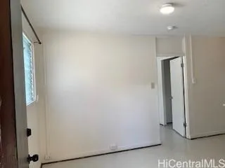 a view of a hallway with closet