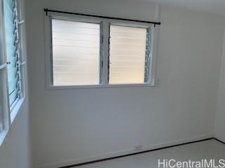 927 Spencer Street, Unit A1 Honolulu, HI 96822 - Photo 7 of 13 a view of a window in an empty room
