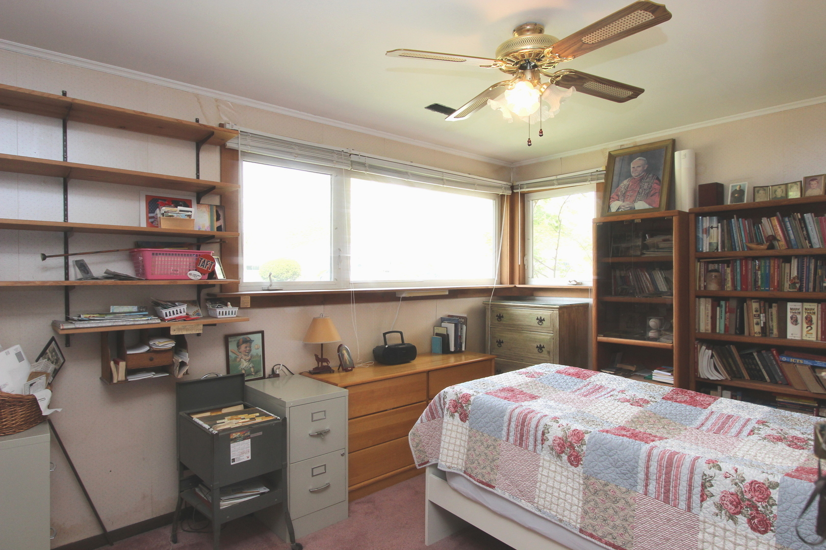2457 Hawthorne Road Homewood, IL 60430 - Photo 14 of 20 a bedroom with a bed a large window with table and chairs