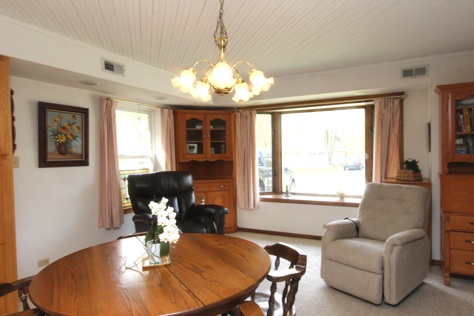 2457 Hawthorne Road Homewood, IL 60430 - Photo 2 of 20 a living room with furniture and a chandelier