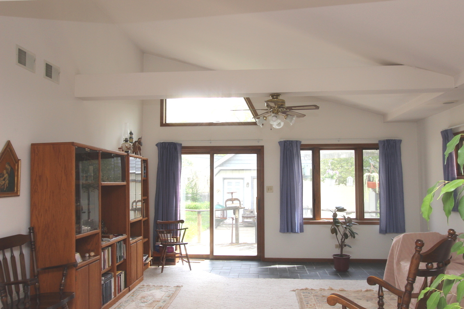 2457 Hawthorne Road Homewood, IL 60430 - Photo 9 of 20 a living room with furniture a window and flat screen tv