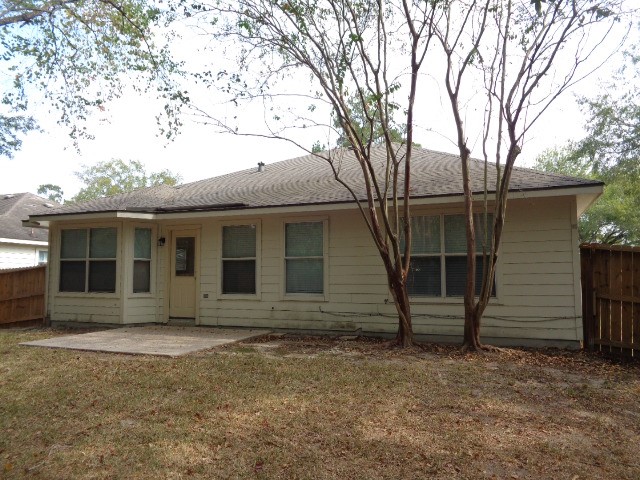 17136 Gleneagle Drive South Conroe, TX 77385 - Photo 19 of 19 front view of a house with a bench