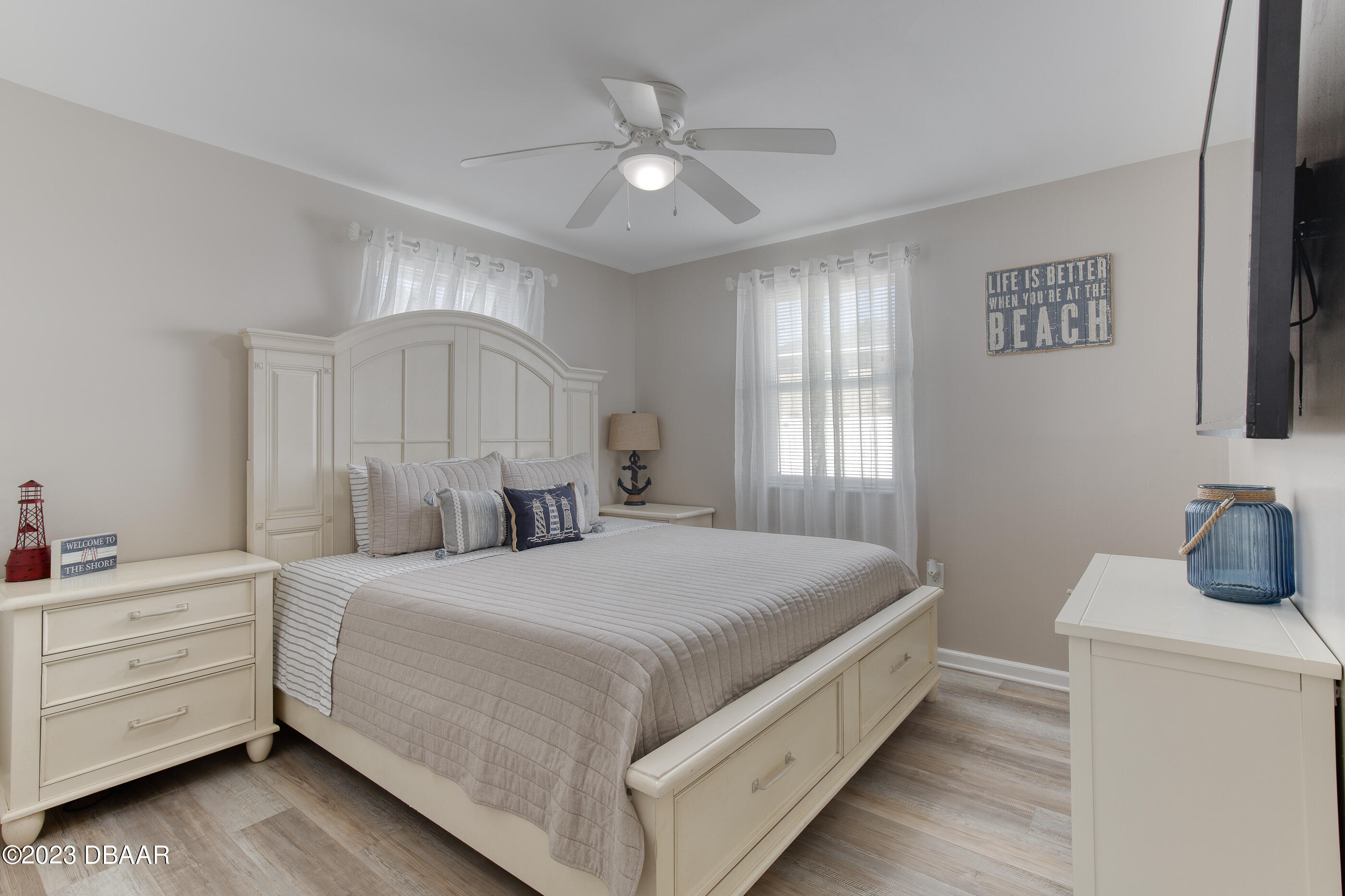 103 Roberta Road Ormond Beach, FL 32176 - Photo 16 of 56 a bedroom with a bed and a dresser