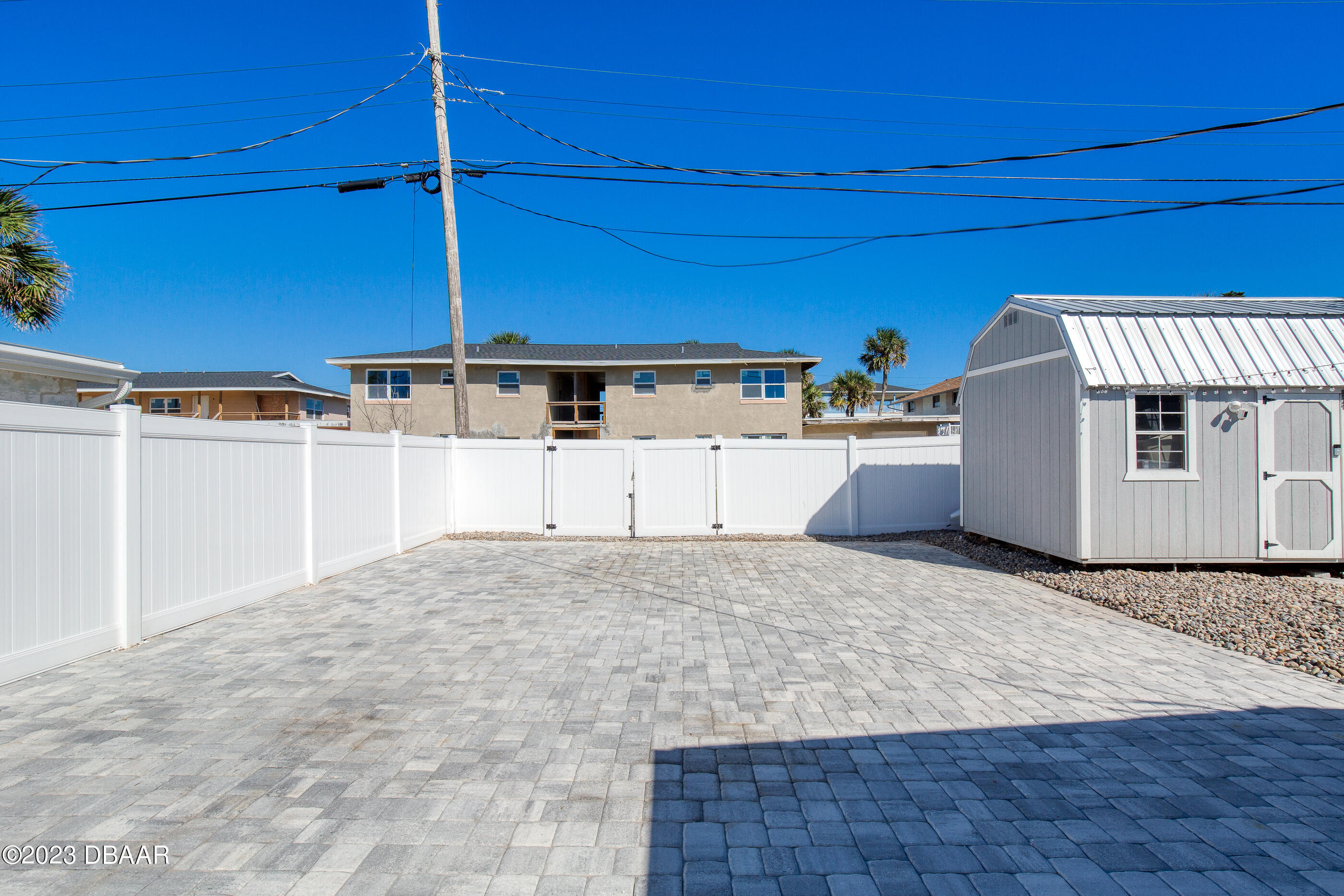 103 Roberta Road Ormond Beach, FL 32176 - Photo 26 of 56 a view of a kitchen with a fridge