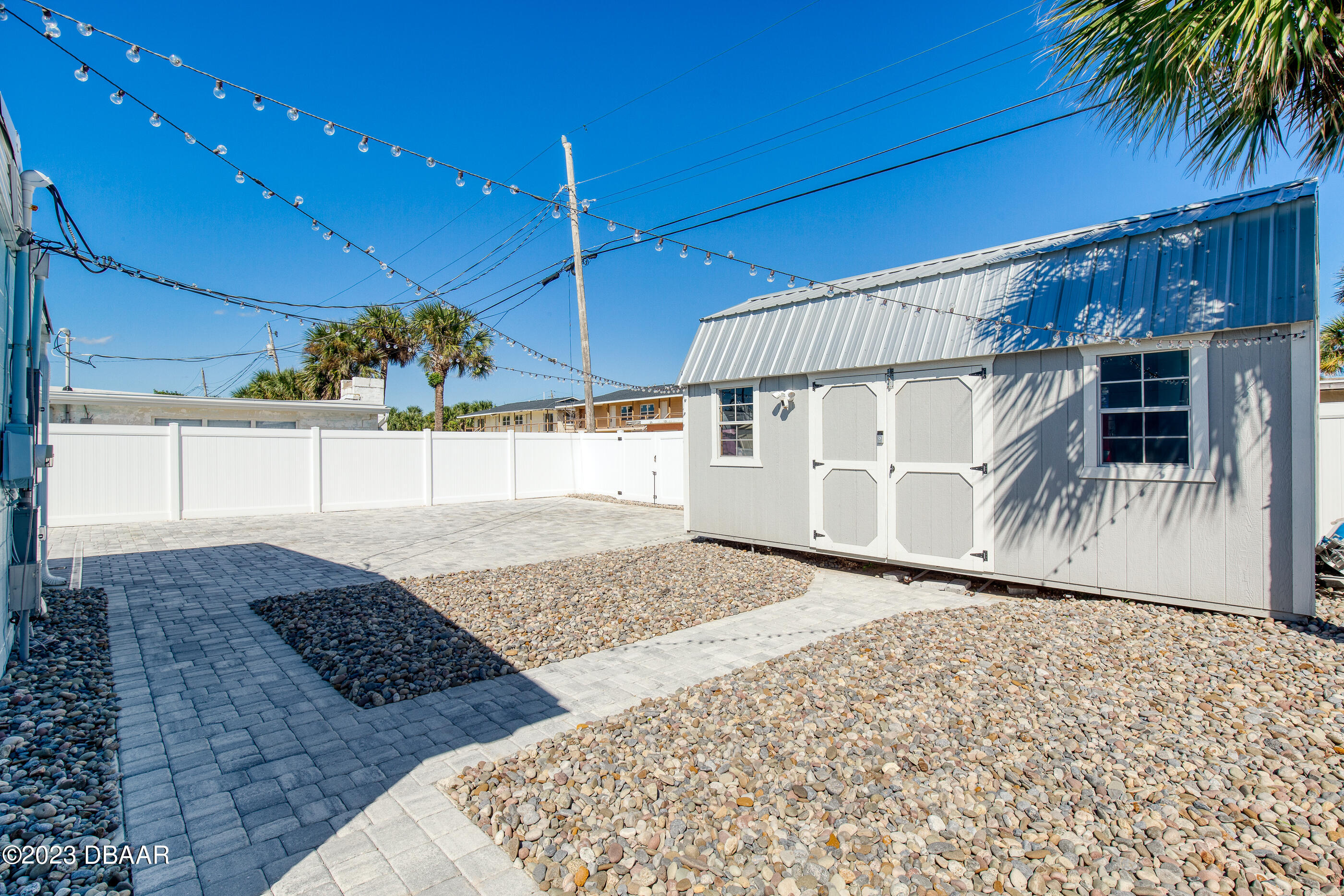 103 Roberta Road Ormond Beach, FL 32176 - Photo 31 of 56 a view of a livingroom with a patio