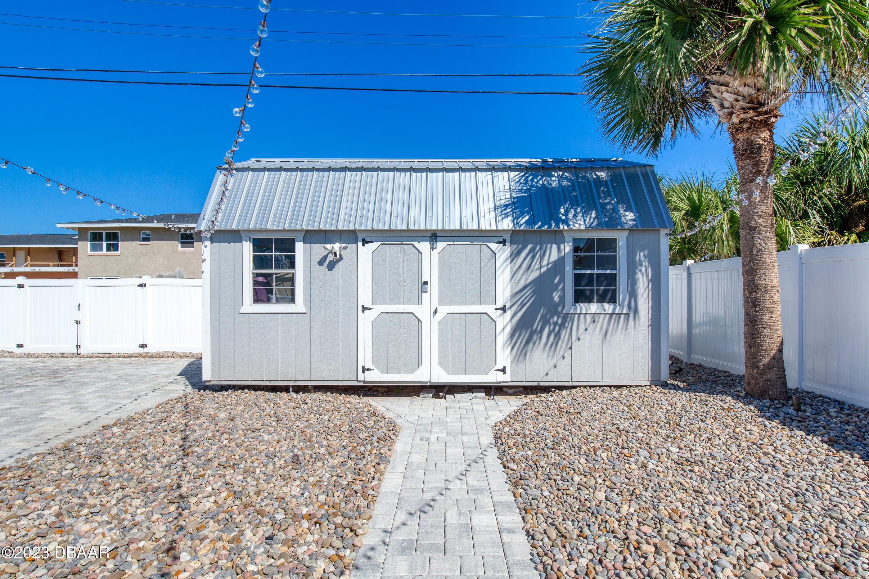 103 Roberta Road Ormond Beach, FL 32176 - Photo 32 of 56 a front view of a house with a yard