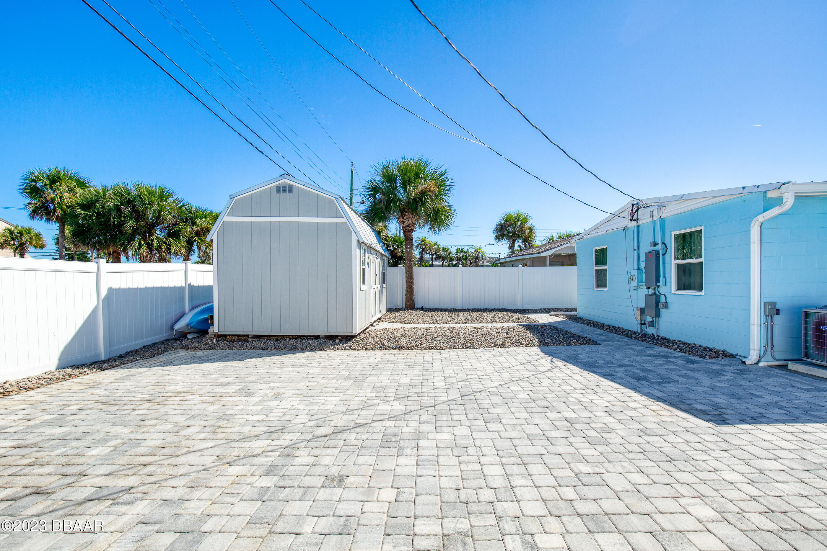 103 Roberta Road Ormond Beach, FL 32176 - Photo 34 of 56 a view of a house with a yard