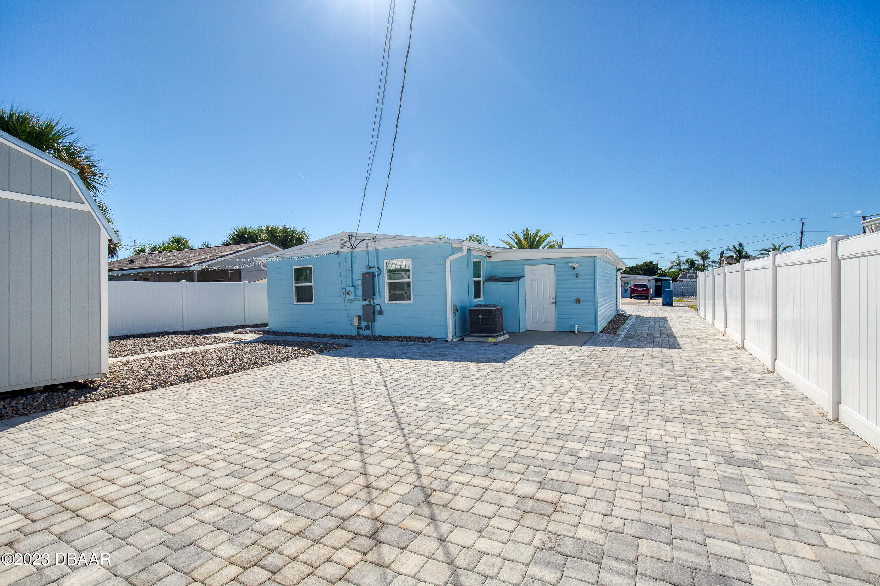 103 Roberta Road Ormond Beach, FL 32176 - Photo 35 of 56 a view of a house with a snow in the yard