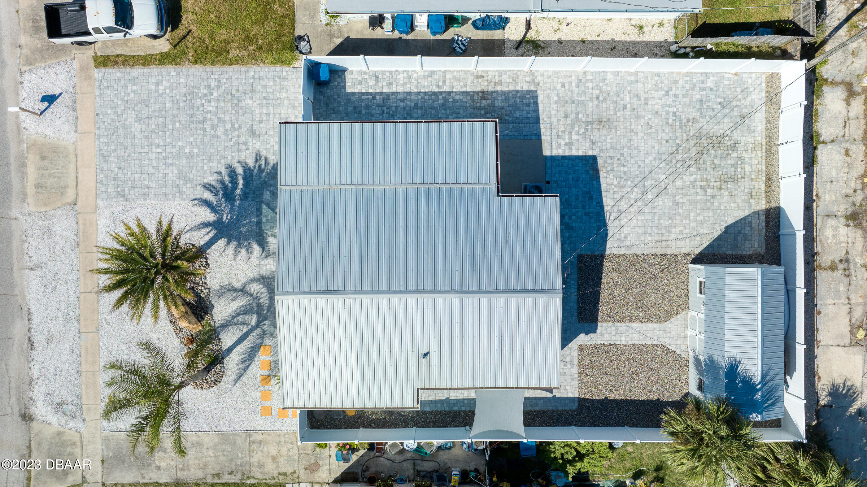 103 Roberta Road Ormond Beach, FL 32176 - Photo 37 of 56 a potted plant sitting on top of a sink