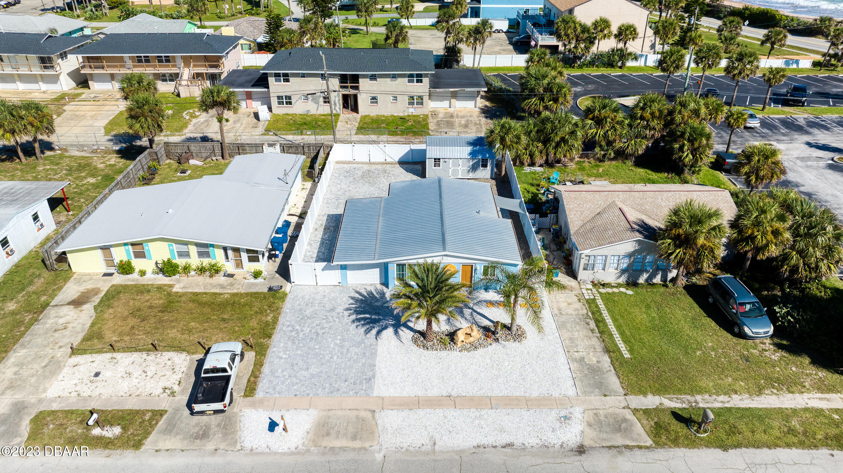 103 Roberta Road Ormond Beach, FL 32176 - Photo 39 of 56 an aerial view of a house with a swimming pool