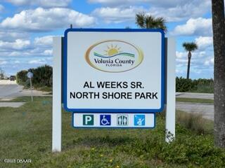 103 Roberta Road Ormond Beach, FL 32176 - Photo 49 of 56 a sign broad on the side of the road