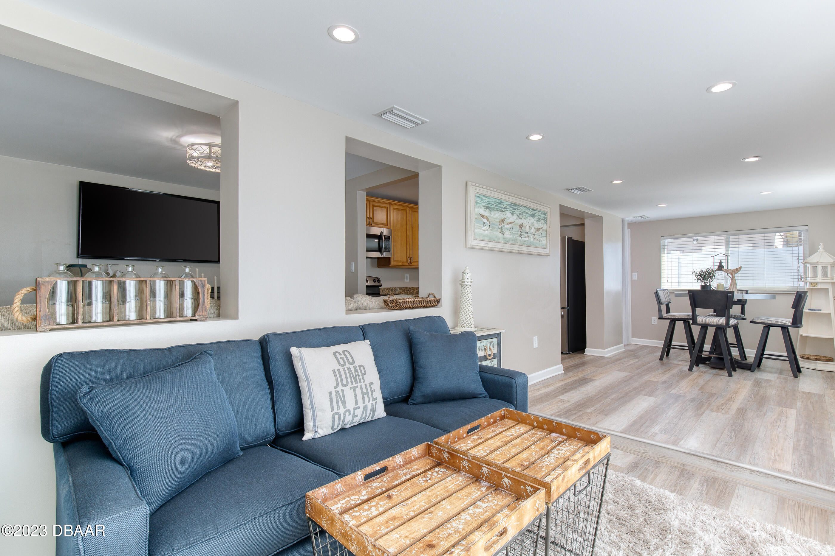 103 Roberta Road Ormond Beach, FL 32176 - Photo 9 of 56 a living room with furniture and a flat screen tv