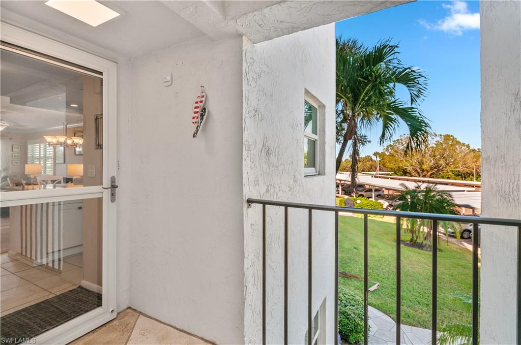 37 High Point Circle East, Unit 210 Naples, FL 34103 - Photo 25 of 29 a view of a balcony