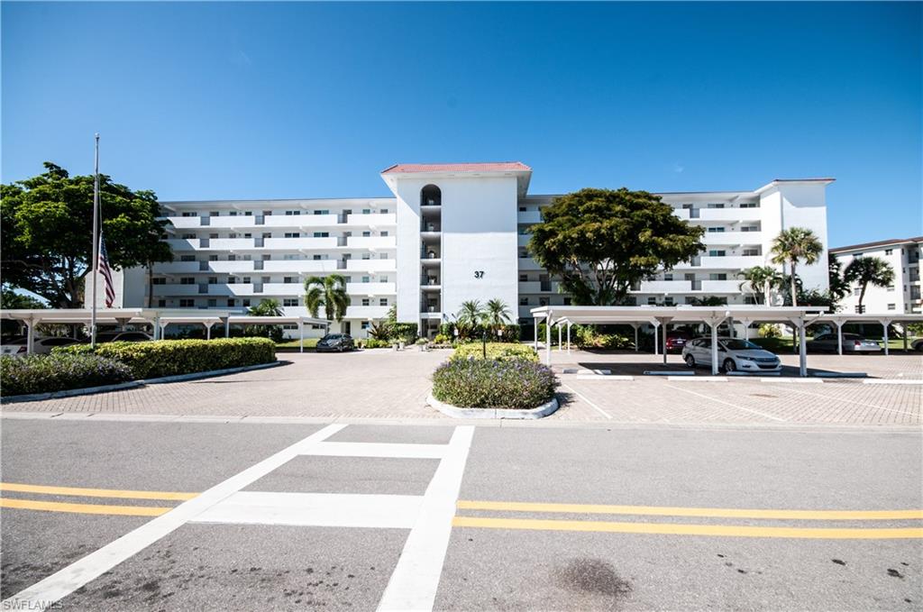 37 High Point Circle East, Unit 210 Naples, FL 34103 - Photo 28 of 29 a view of a city