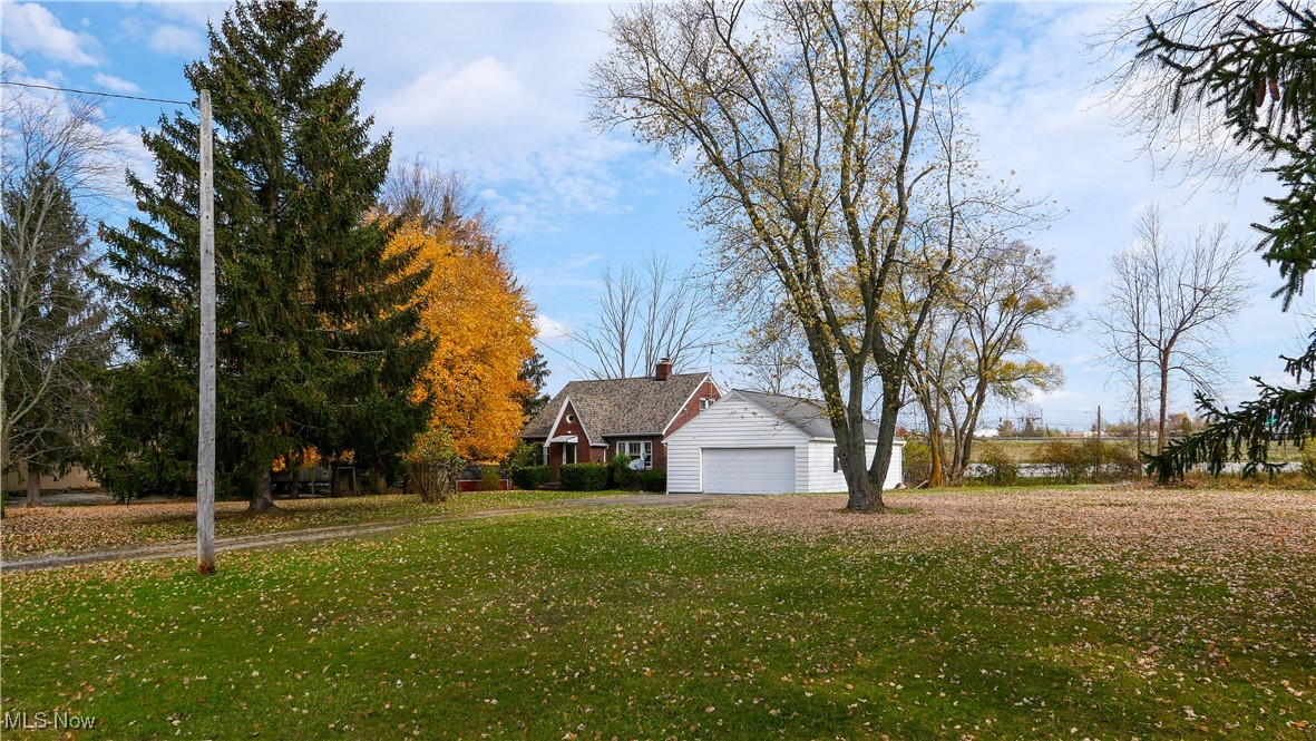 10078 Ellsworth Road Hudson, OH 44236 - Photo 28 of 34 View of yard with a garage