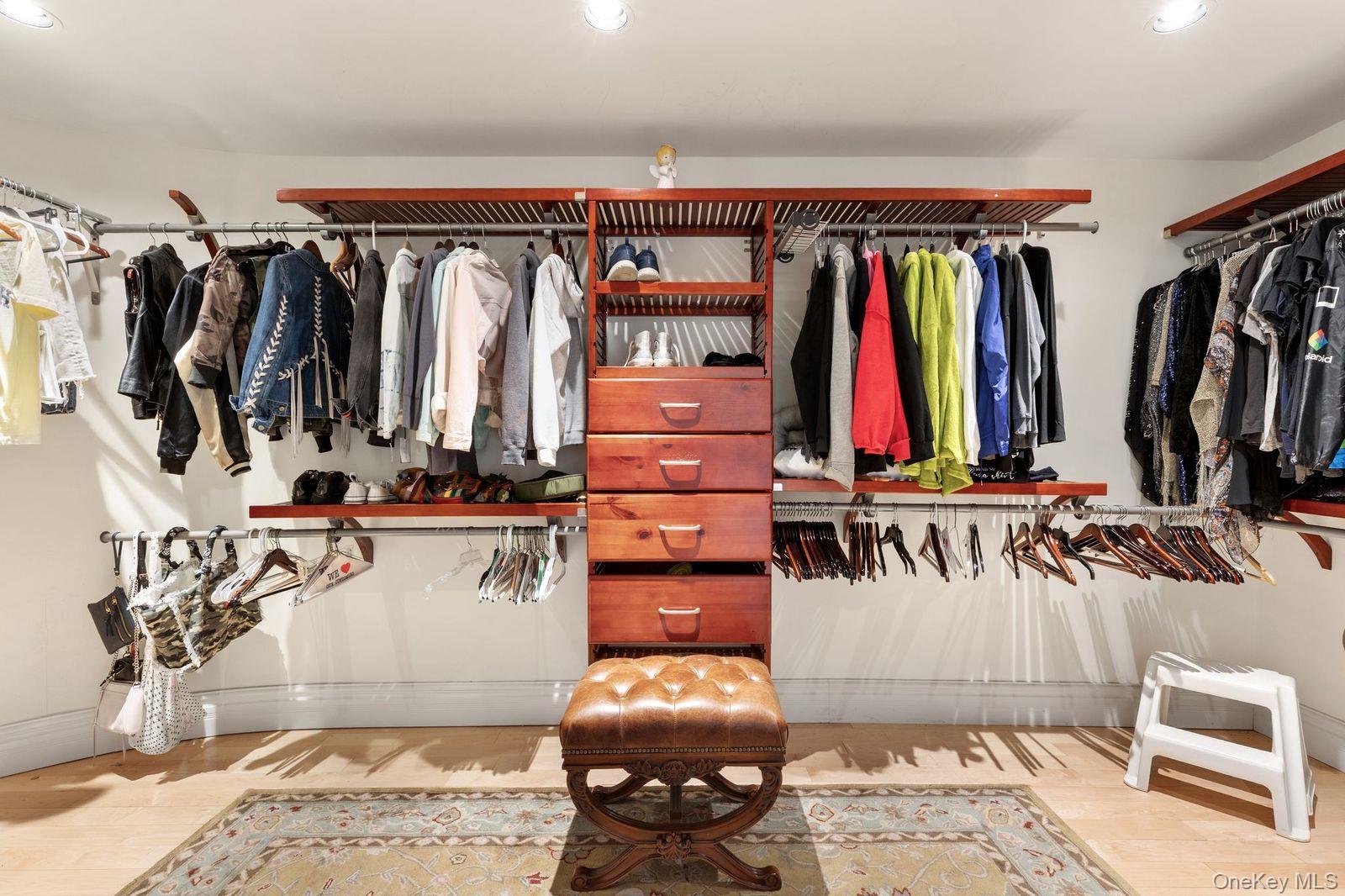 33 Beach Road Northport, NY 11768 - Photo 25 of 50 a view of walk in closet with clothes and shoes