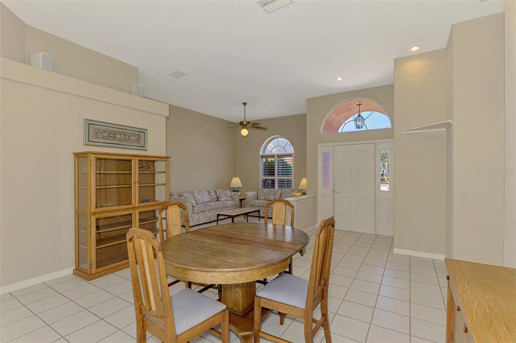 3634 Pennyroyal Road Port Charlotte, FL 33953 - Photo 11 of 91 a view of a dining room with furniture