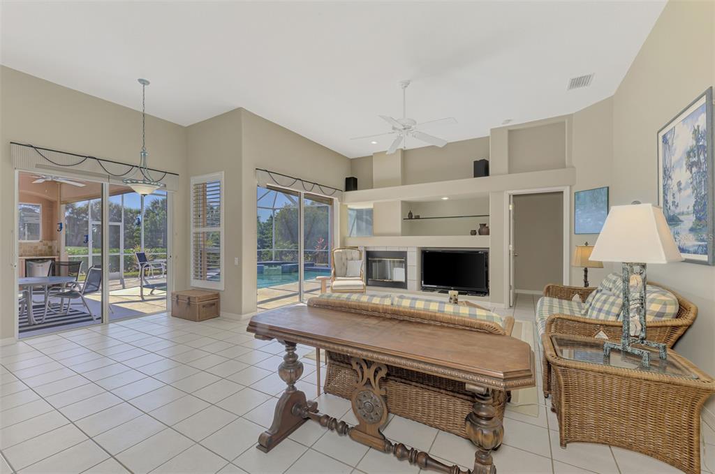 3634 Pennyroyal Road Port Charlotte, FL 33953 - Photo 19 of 91 a view of a livingroom with furniture and a fireplace