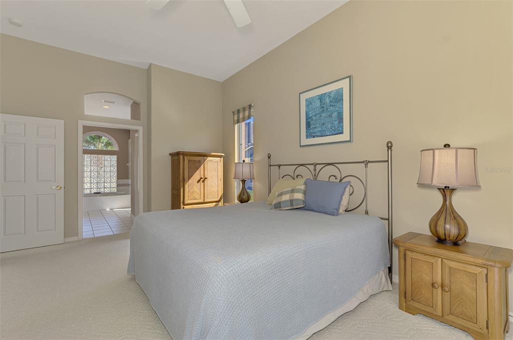 3634 Pennyroyal Road Port Charlotte, FL 33953 - Photo 33 of 91 a bedroom with a bed and a couch