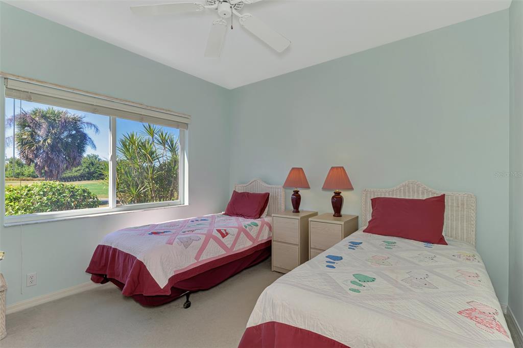 3634 Pennyroyal Road Port Charlotte, FL 33953 - Photo 42 of 91 a bedroom with two beds and a window