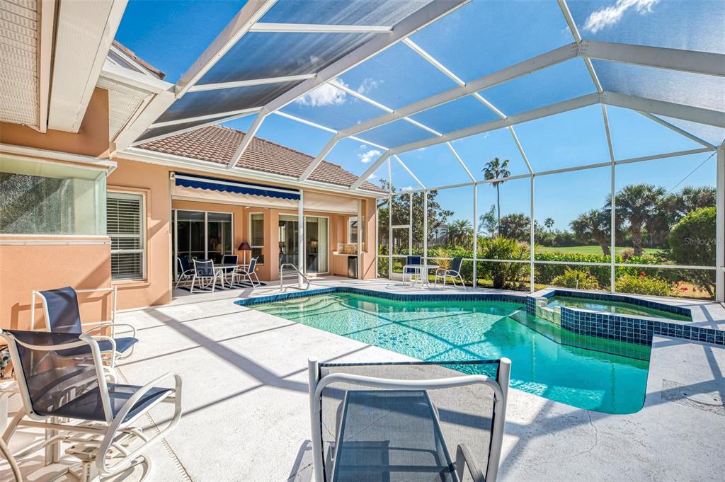 3634 Pennyroyal Road Port Charlotte, FL 33953 - Photo 51 of 91 a view of a backyard with sitting area and furniture