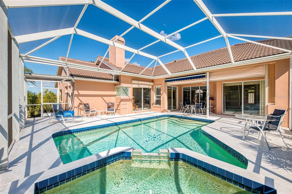 3634 Pennyroyal Road Port Charlotte, FL 33953 - Photo 52 of 91 a view of a house with backyard from a patio