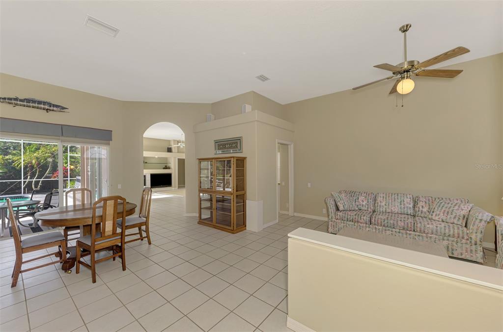 3634 Pennyroyal Road Port Charlotte, FL 33953 - Photo 6 of 91 a living room with furniture and two window